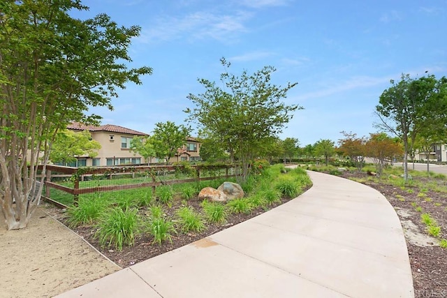 view of property's community with fence