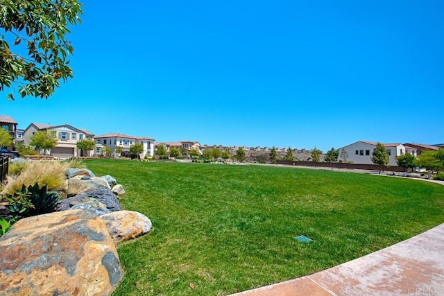 view of yard with a residential view