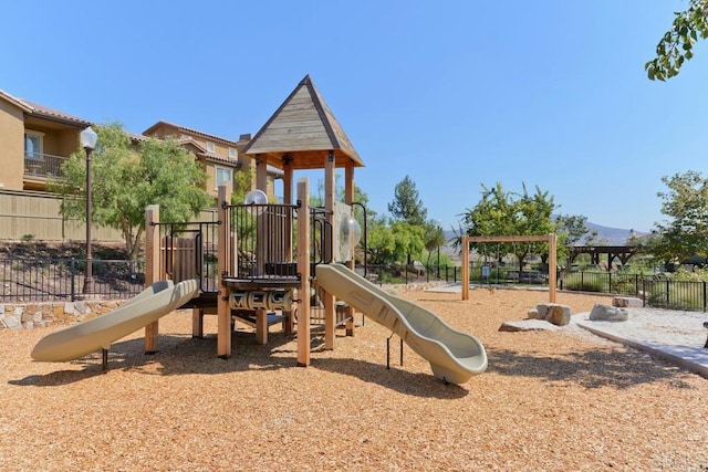 community playground featuring fence