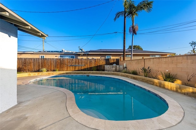 view of pool with a patio area, a fenced backyard, and a fenced in pool