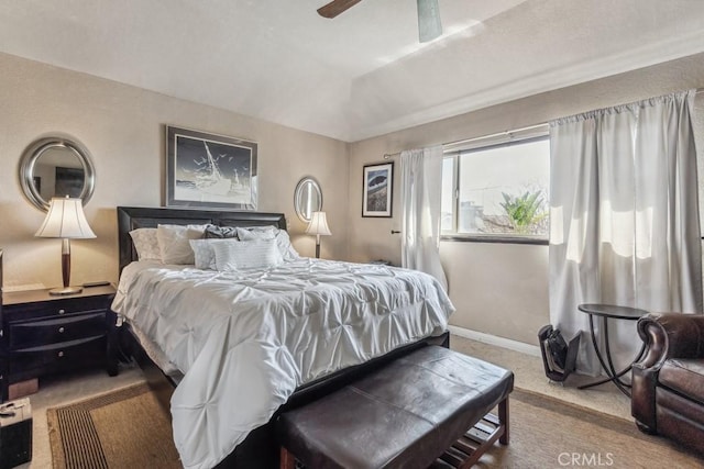 bedroom featuring carpet, a ceiling fan, and baseboards