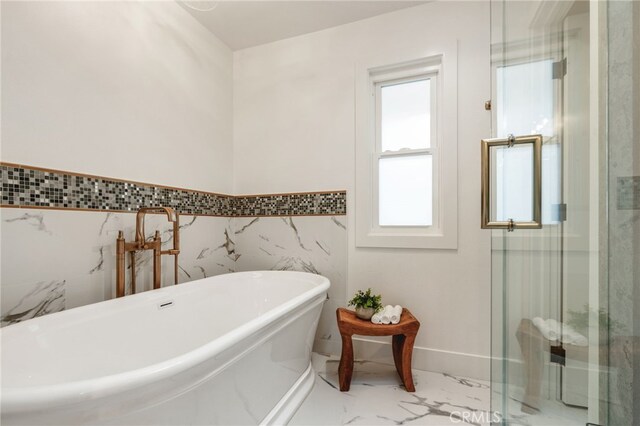 207 E Edgewater Ave Unit A, Newport Beach, CA 92661 - full bath featuring a shower stall, a freestanding tub, marble finish floor, and wainscoting