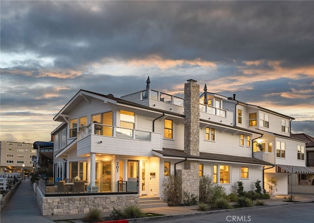 207 E Edgewater Ave Unit A, Newport Beach, CA 92661 - back of property featuring stone siding