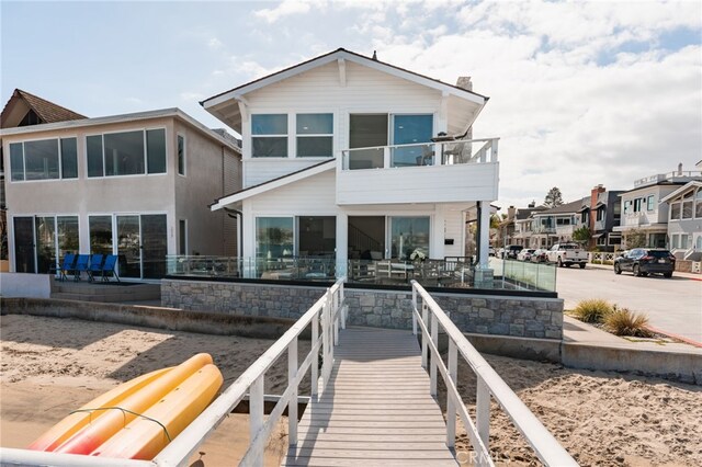 207 E Edgewater Ave Unit A, Newport Beach, CA 92661 - rear view of house featuring a patio area, a residential view, and a balcony