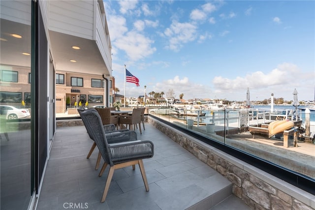 207 E Edgewater Ave Unit A, Newport Beach, CA 92661 - view of patio with a balcony and a water view