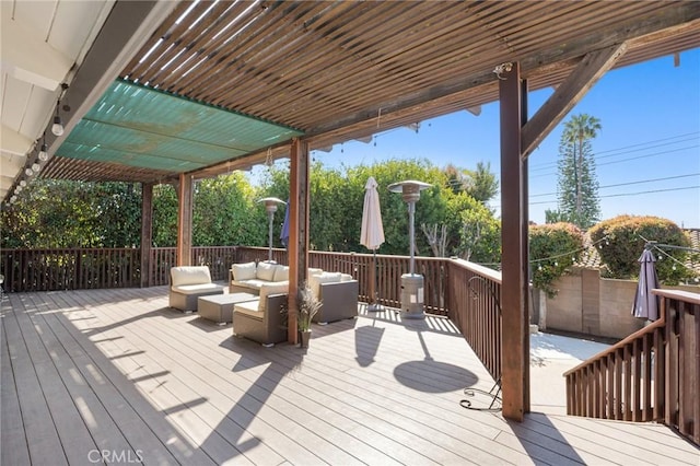 wooden terrace featuring an outdoor hangout area