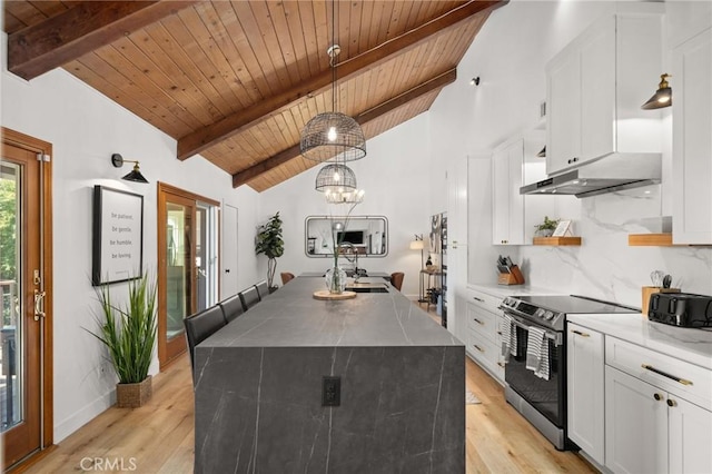 kitchen with a sink, white cabinetry, open shelves, and electric stove