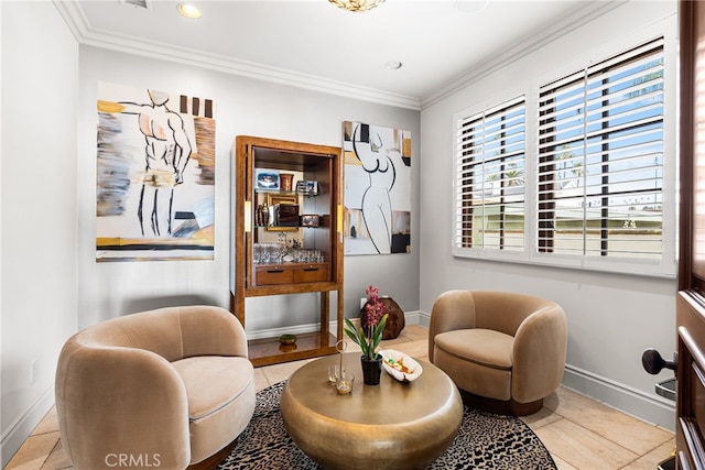 sitting room with ornamental molding, recessed lighting, and baseboards