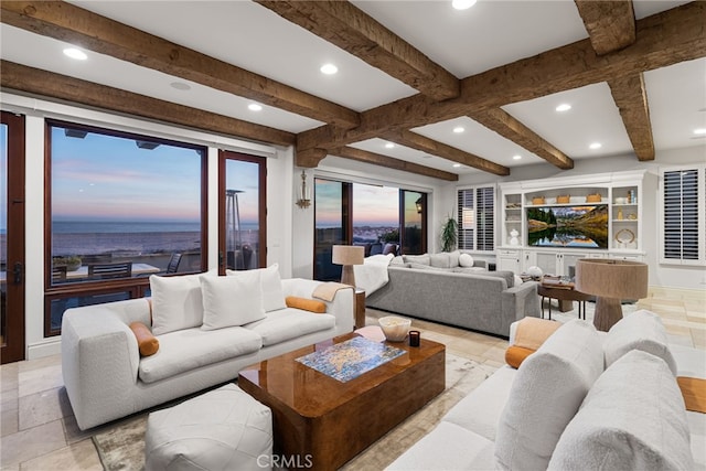 living area featuring recessed lighting and beamed ceiling