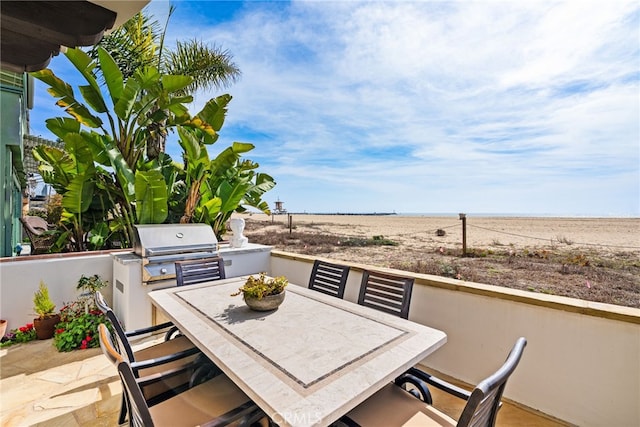 view of patio / terrace with a grill and outdoor dining area