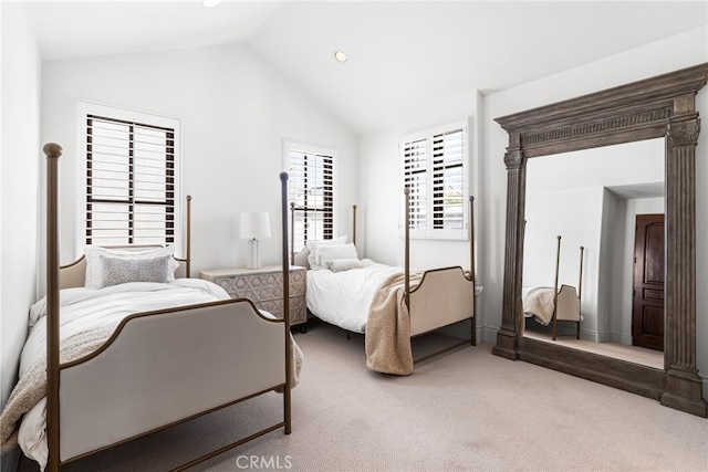 bedroom featuring recessed lighting, vaulted ceiling, and light carpet