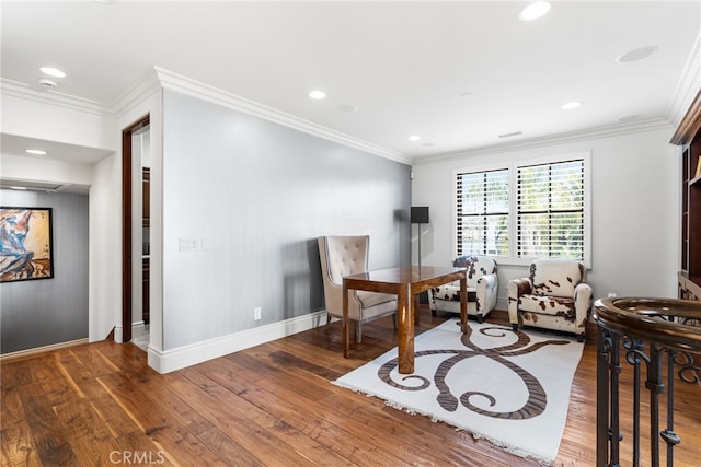 sitting room with ornamental molding, recessed lighting, baseboards, and wood finished floors