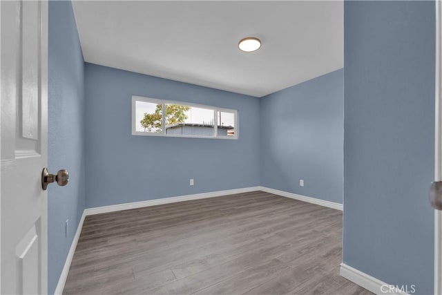 34945 Ave B, Yucaipa, CA 92399 - spare room with baseboards and wood finished floors