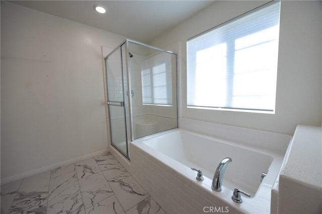 full bath with a garden tub, recessed lighting, baseboards, marble finish floor, and a shower stall