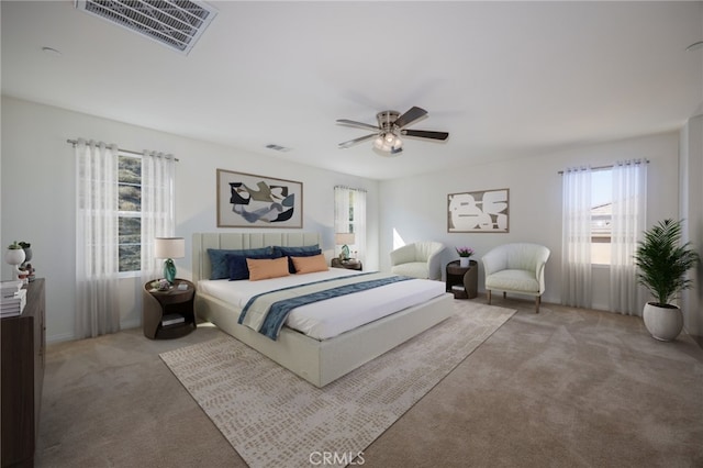 bedroom with light carpet, ceiling fan, multiple windows, and visible vents