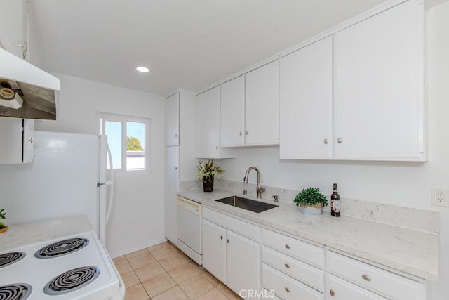 kitchen with white appliances, white cabinetry, a sink, and under cabinet range hood