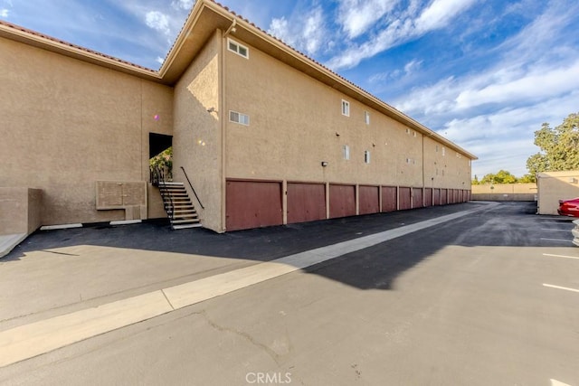 exterior space featuring stucco siding