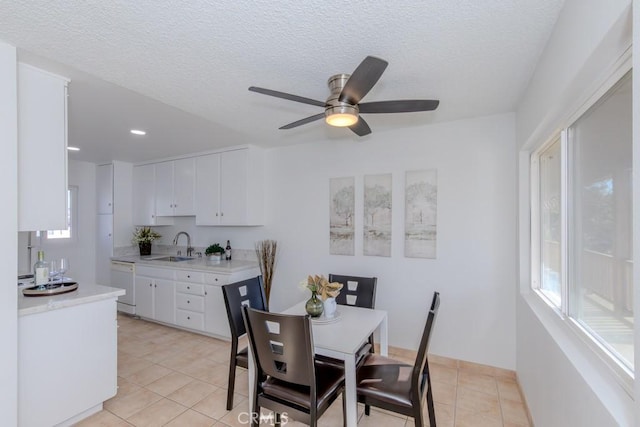 dining room with light tile patterned floors, a textured ceiling, a ceiling fan, and recessed lighting