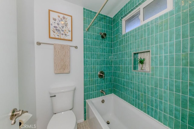 bathroom with toilet and shower / bathtub combination