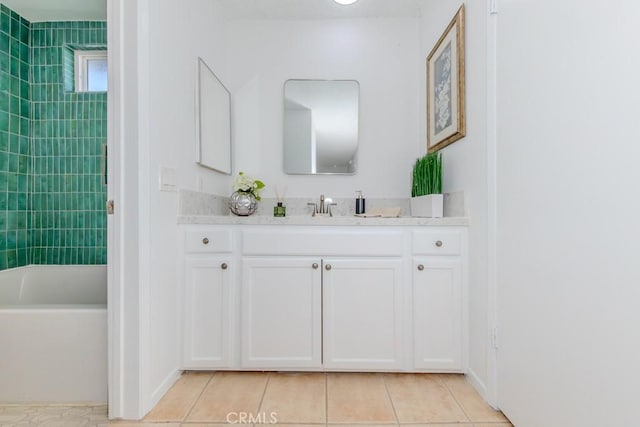 full bathroom with  shower combination, tile patterned flooring, and vanity