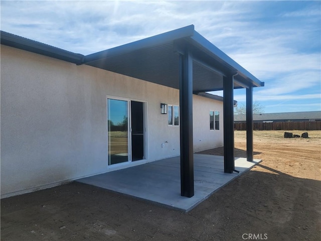 view of patio / terrace with fence