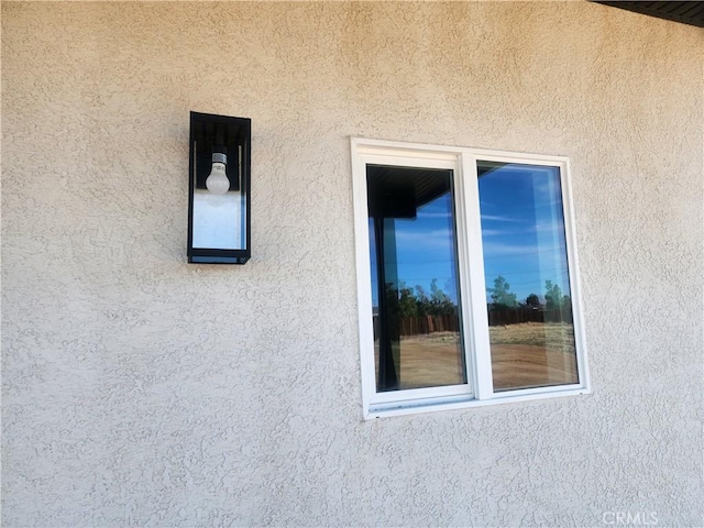 exterior details with stucco siding