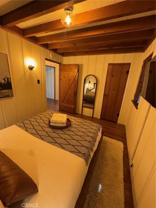 283 Walnut Dr, Lake Arrowhead, CA 92352 - bedroom with beam ceiling and a decorative wall