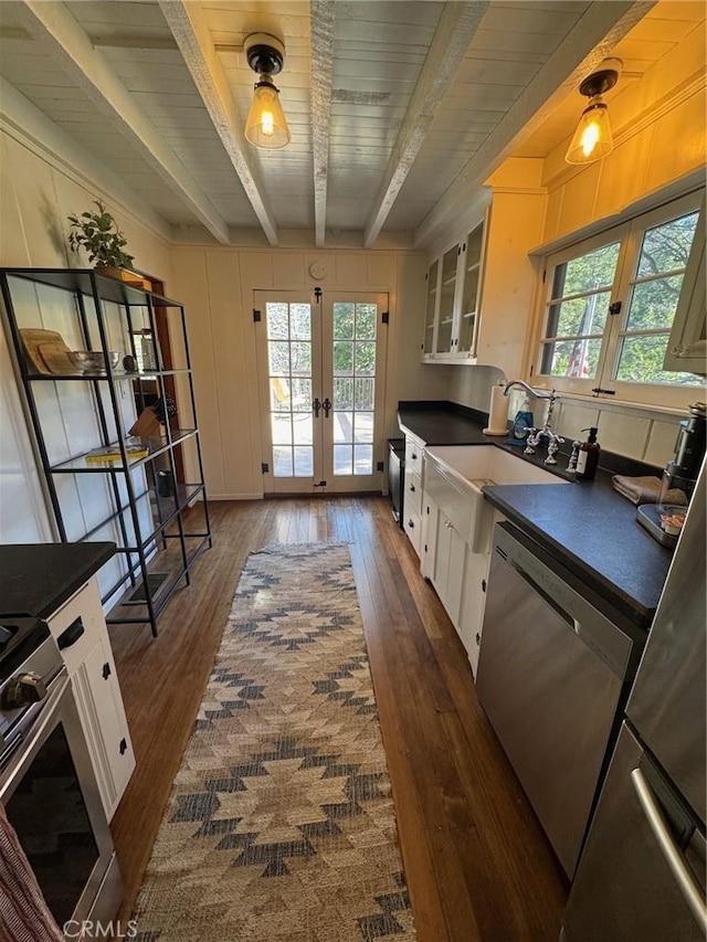 283 Walnut Dr, Lake Arrowhead, CA 92352 - kitchen featuring french doors, dark countertops, white cabinetry, stainless steel appliances, and dark wood finished floors
