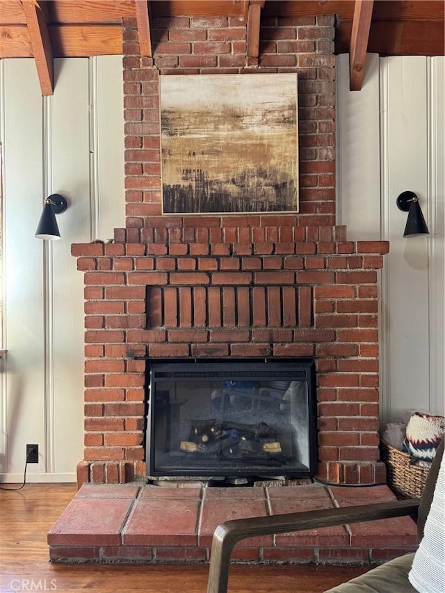 283 Walnut Dr, Lake Arrowhead, CA 92352 - detailed view of a brick fireplace and wood finished floors