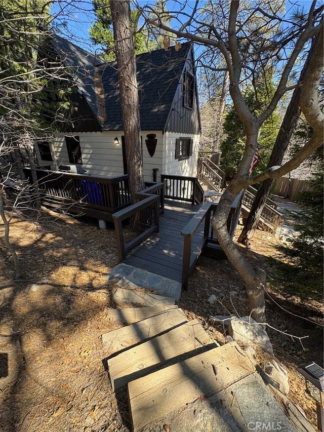 283 Walnut Dr, Lake Arrowhead, CA 92352 - view of front of home with a wooden deck and roof with shingles