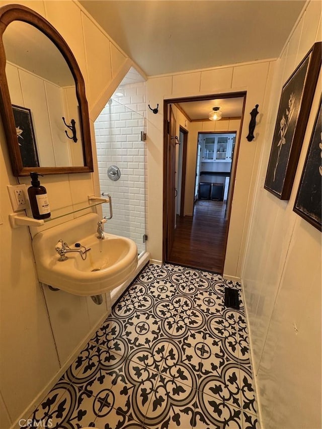 283 Walnut Dr, Lake Arrowhead, CA 92352 - bathroom with a sink, a stall shower, and baseboards