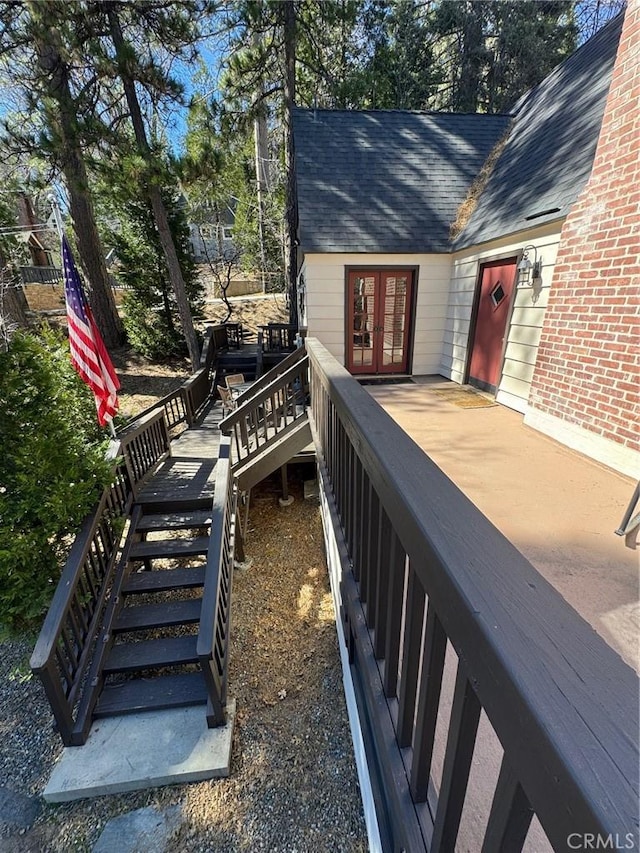 283 Walnut Dr, Lake Arrowhead, CA 92352 - wooden terrace with french doors and stairway