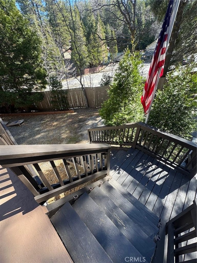 283 Walnut Dr, Lake Arrowhead, CA 92352 - wooden terrace with view of wooded area