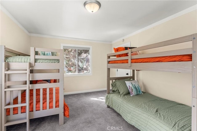 bedroom with carpet floors, baseboards, and ornamental molding