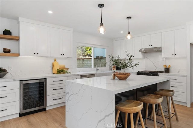 kitchen featuring beverage cooler, open shelves, white cabinetry, and under cabinet range hood