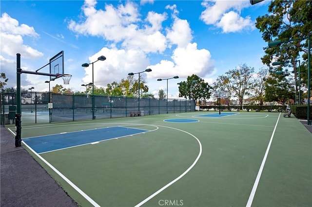 view of sport court with community basketball court and fence