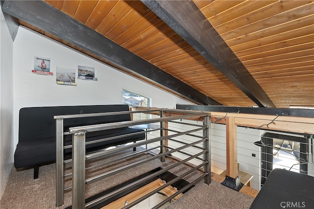 interior space with vaulted ceiling with beams and wood ceiling