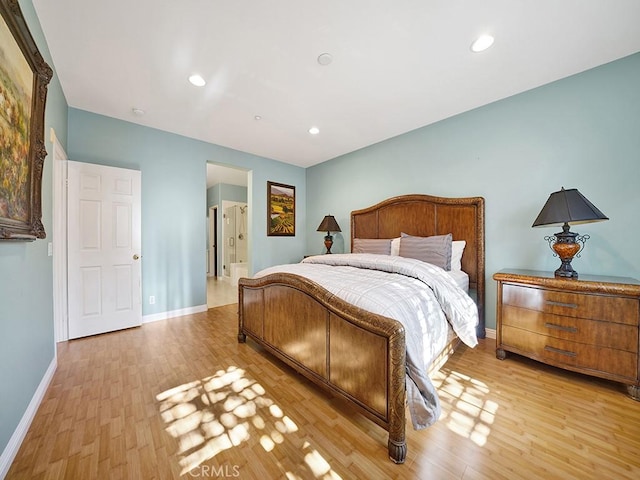 bedroom featuring light wood-style floors, baseboards, and recessed lighting