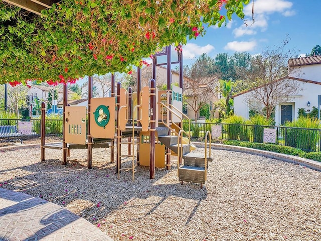 community playground featuring fence