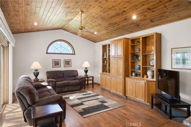 living area with wood finished floors, recessed lighting, wooden ceiling, ceiling fan, and vaulted ceiling