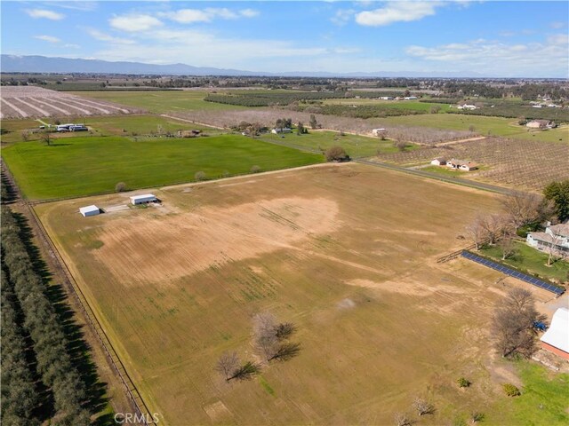 birds eye view of property with a rural view and a mountain view