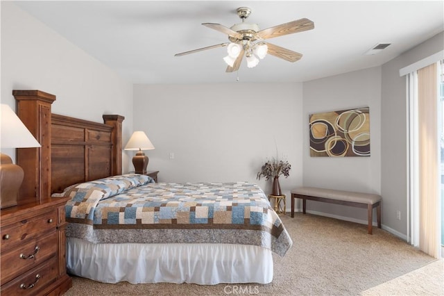 bedroom featuring carpet flooring, ceiling fan, baseboards, and visible vents