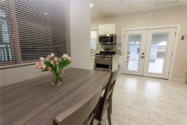 dining area featuring french doors