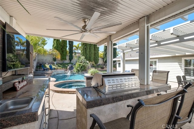 view of patio with an outdoor kitchen, a fenced backyard, an in ground hot tub, a sink, and a pergola