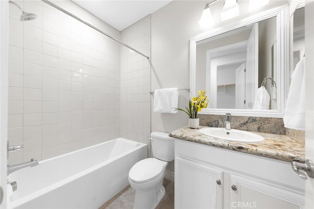 full bath featuring shower / tub combination, vanity, and toilet