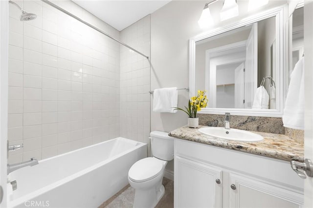 full bath with shower / bathing tub combination, vanity, and toilet