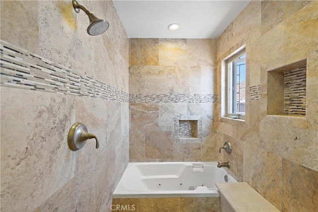 full bathroom with a jetted tub and a tile shower