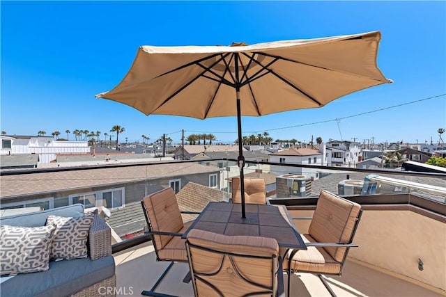 balcony featuring a residential view