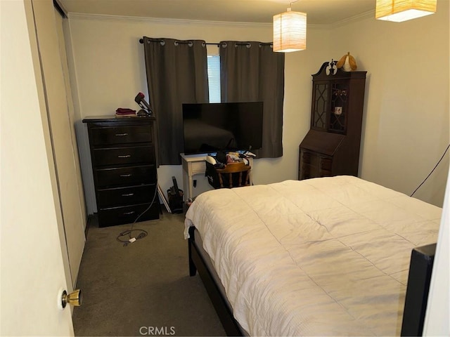 carpeted bedroom featuring ornamental molding