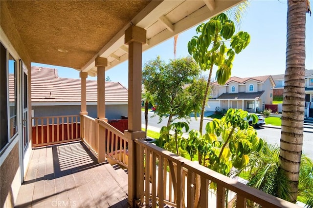 balcony featuring a residential view